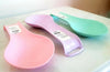 Pack of 3 colorful non-slip kitchen spoon rests for cooking utensils, spatulas, and spoons. Heat-resistant organizers.