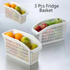 Set of 3 white plastic fridge organizer baskets for storing fruits, vegetables, and kitchen accessories. Space saver.