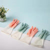 Silicone cleaning gloves with built-in scrubbers, perfect as rubber dishwashing gloves and kitchen cleaning tools.