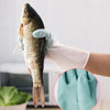 Silicone dishwashing cleaning gloves with built-in scrubber bristles, perfect for kitchen cleaning tasks and handling fish.