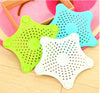 Silicone star sink strainer and hair catcher set with suction cups for bathroom or kitchen drain protection.