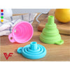 Folding and space-saving silicone collapsible kitchen funnels in pink, green, and blue for easy storage.