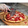 Professional stainless steel pizza cutter wheel slicing a pepperoni pizza on a wooden cutting board.
