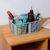 Portable plastic divided storage basket with handle, used as a kitchen sink, bathroom, or tool organizer.