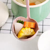 2-in-1 plastic draining soup spoon and colander scoop with vegetables, durable kitchen strainer for easy draining.