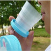 2-Piece Collapsible Travel Cup Set in blue with cute bunny design, perfect for camping and portable drinking.