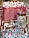 Stanley x LoveShackFancy stainless steel vacuum travel mug with handle in floral print with matching gift box and bag.