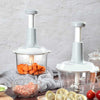 Hand Press Food Chopper 1.5 with clear container and stainless steel blades for chopping vegetables and meat in kitchen.