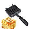 Non Stick Waffle Maker with black heat-resistant handle, used to cook golden waffles with syrup for easy breakfast.