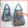 Net Basket for Vegetable, wall-hanging mesh storage bag for organizing garlic, ginger, and carrots in the kitchen.