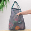 Net basket for vegetable with breathable mesh, hanging kitchen storage bag for fresh produce and onions.