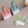 Set of mini hand brush and dustpan cleaning tool kits in assorted pastel colors for desk and home cleaning.