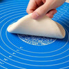 Round silicone roti mat with measurement markings for rolling dough, ideal for non-stick baking and pastry prep.