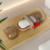 Plastic soap dish with cover, featuring a portable, drainable design for bathroom or travel storage.
