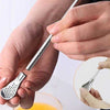 Stainless steel spoon with straw featuring a detachable tea filter head for loose leaf tea and beverage stirring.