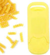 Manual plastic dumpling mold and gnocchi board for making homemade pasta shapes next to scattered rotini.