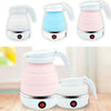 Portable folding electric kettle set in white, blue, and pink for travel, featuring collapsible silicone design.