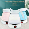 Folding electric kettle in pink, white, and blue, perfect as a portable travel water boiler for home or camping.