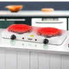 Double Electric Stove by RAF with two glowing hot plates for efficient tabletop cooking in a white finish.