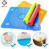 Silicone baking mat set for non-stick dough rolling, featuring measurement markings and easy-to-clean food-grade surface.