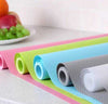 Colorful Fridge Mat Rolls, non-slip waterproof liners for kitchen shelves and refrigerator drawers.
