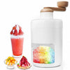 White manual ice crusher for shaved ice, slushies, and desserts with hand crank and transparent ice collection bin.