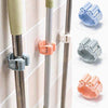 Broom Holder Clips for wall-mounted mops and cleaning tools, featuring adhesive backing for easy home organization.