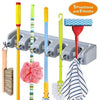 5 in 1 Mop Holder wall mount organizer with 5 slots and 6 hooks for brooms, mops, and cleaning tools.