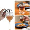 Honey Jar Dispenser with trigger handle for easy non-drip syrup and honey pouring over toast.