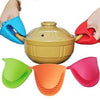 Silicone pot holder mini oven gloves for cooking, heat-resistant pinch handle grips, set of multi-colored kitchen mitts.
