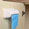 Wall-mounted garbage bag storage box and adhesive kitchen bag dispenser attached to a cabinet door.