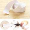 White PVC self-adhesive wall sealing tape for kitchen and bathroom crack repair and mildew-proof corner line sealing.