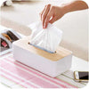 Wooden tissue box cover, a rectangular handcrafted facial tissue holder with a white base and natural wood top.