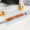 Reusable manual kabab press mould, heavy-duty seekh kebab maker used for shaping meat on a skewer with plastic film.