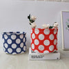 Round organizing baskets in red and blue polka dots, premium quality multipurpose fabric storage bins for home decor.