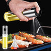 100ml Oil Spray Bottle, Stainless Steel & Glass Olive Oil Mister spraying oil on shrimp while cooking.