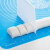 Rotimatt non-stick silicone mat for roti and chapati with dough scraper, featuring measurement markings for baking.