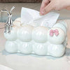 Bubble Bow Tissue Box with a silver rabbit figurine and pink bow, white decorative tissue holder for home decor.