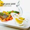 Bird Shape Manual Lemon Squeezer, an elegant acrylic citrus juicer extracting fresh lemon juice over a salmon meal.