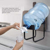 Metal stand for 19L water bottle with tap and nozzle for convenient countertop dispensing.