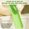 Silicone sink splash guard with suction cups being rinsed with water, easy-to-clean kitchen and bathroom splatter board.