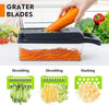 16-in-1 vegetable cutter, multifunctional chopper, and mandoline slicer shredding carrots with interchangeable blades.