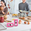 Stainless Steel Egg Shell Opener as a precise egg topper for soft and hard boiled eggs on a modern kitchen counter.