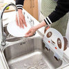 Panda kitchen sink splash guard, a water splash-proof silicone barrier suctioned to a stainless steel sink while washing.