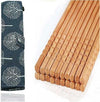Pack of 10 pairs reusable bamboo chopsticks with non-slip texture and decorative fabric storage pouch.
