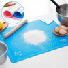 Rotimatt non-stick silicone mat with measurement markings for rolling out dough, chapati, and roti on a kitchen counter.