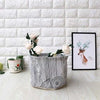 Round organizing basket with black and white wood grain pattern, premium multipurpose storage bin for home decor.