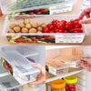 Meat storage container with removable drain plate and lid for organizing fresh fruits, vegetables, and meat in fridge.
