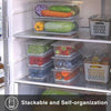 Stackable meat storage container with drain plate and lid, organizing fresh produce inside a refrigerator.