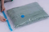 Vacuum Storage Bags Set (5 bags + 1 pump) for space-saving clothing compression and efficient home storage organization.